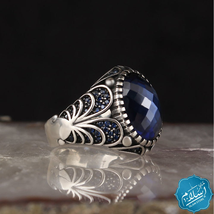 Silver ring with zircon stone blue color